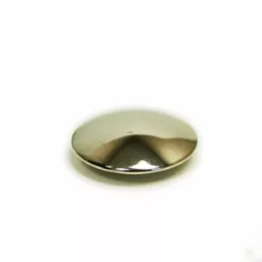 A Macap C0002M135 M4D Push Dial battery with a silver button shape rests on a white surface, seen from the side. © 2025 1st-line.com