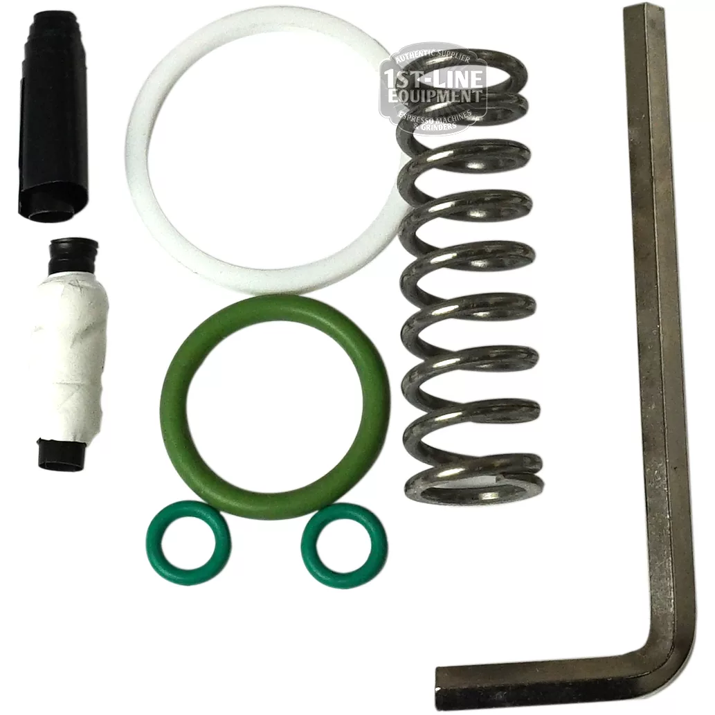 The E61 Grouphead Flow Control Kit includes a metal spring, L-shaped hex key, black plastic part, O-rings, and a green ring—small hardware components displayed on a white background. © 2025 1st-line.com