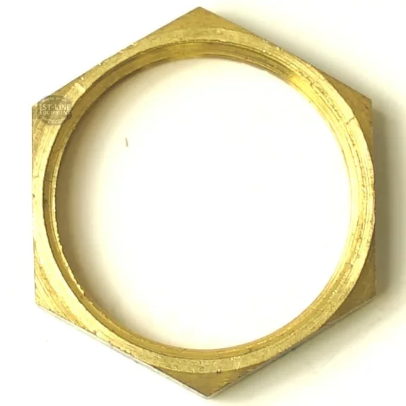 The SM.177 STEAM TAP NUT is a brass hexagonal nut featuring a threaded inner ring, shown from above on a white background. © 2025 1st-line.com