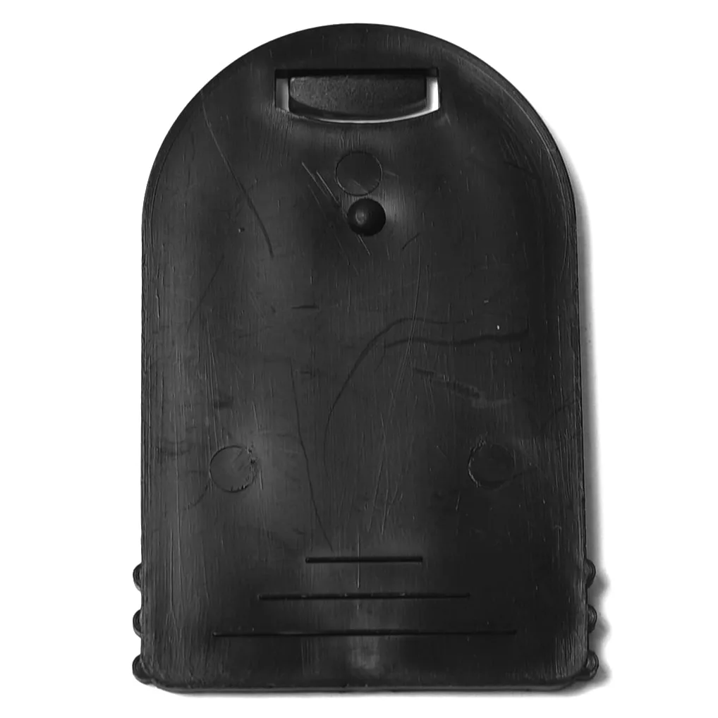 A black, rectangular plastic OB...4 HOPPER OBSTRUCTOR features a rounded top, small rectangular slot near the top, central dot, and faint surface lines with circular marks. © 2025 1st-line.com