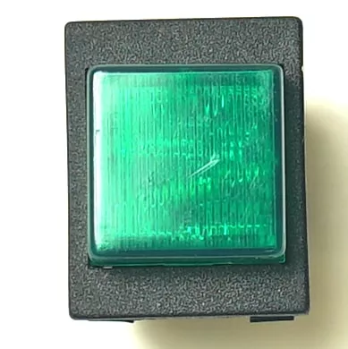 A close-up of a V.4265 27.2x22.2mm LIGHT SWITCH featuring a textured green square button in a black rectangular casing, resembling a modern light switch. © 2025 1st-line.com