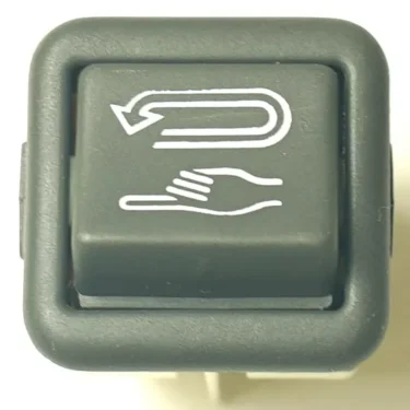A rectangular button with a V.4417 WHITE INDICATOR LIGHT, showing a white curved arrow above an open hand, likely indicating a return or back function on a vehicle dashboard. © 2025 1st-line.com