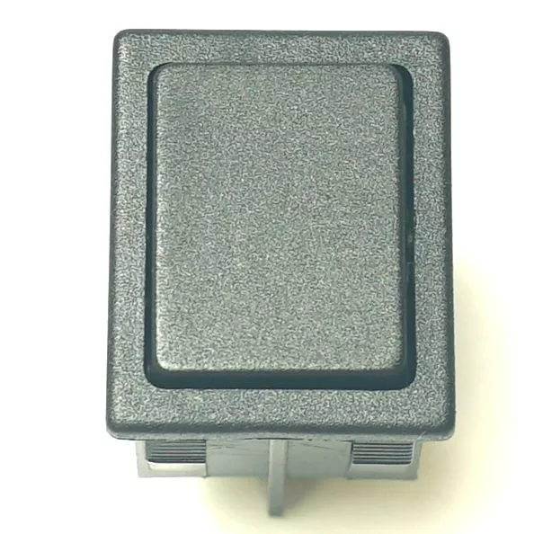 A top view of the V.4296 30x22mm COVER, a rectangular grey plastic rocker switch, displayed against a plain white background. © 2025 1st-line.com