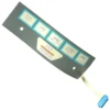 The F.1797 FAEMA E-98 DOSING DEVICE SILKSCREEN features a flat grey panel with five cup-icon buttons outlined in blue, a central STOP PROGRAM label, and a ribbon cable; the icons are silkscreen printed. © 2025 1st-line.com