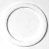 The Gaggia PTFE Heating Element Gasket 50x40x2mm is a smooth, plain white circular ring with uniform thickness, shown lying flat on a lightly textured surface. © 2025 1st-line.com