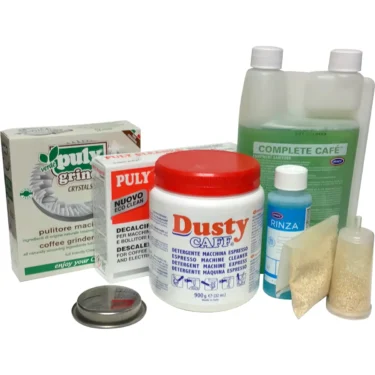 The Maintenance Care Package includes powders, tablets, a liquid bottle, small bottles, a filter, and cleaning crystals&mdash;essential items for coffee machine care&mdash;all arranged on a white background.