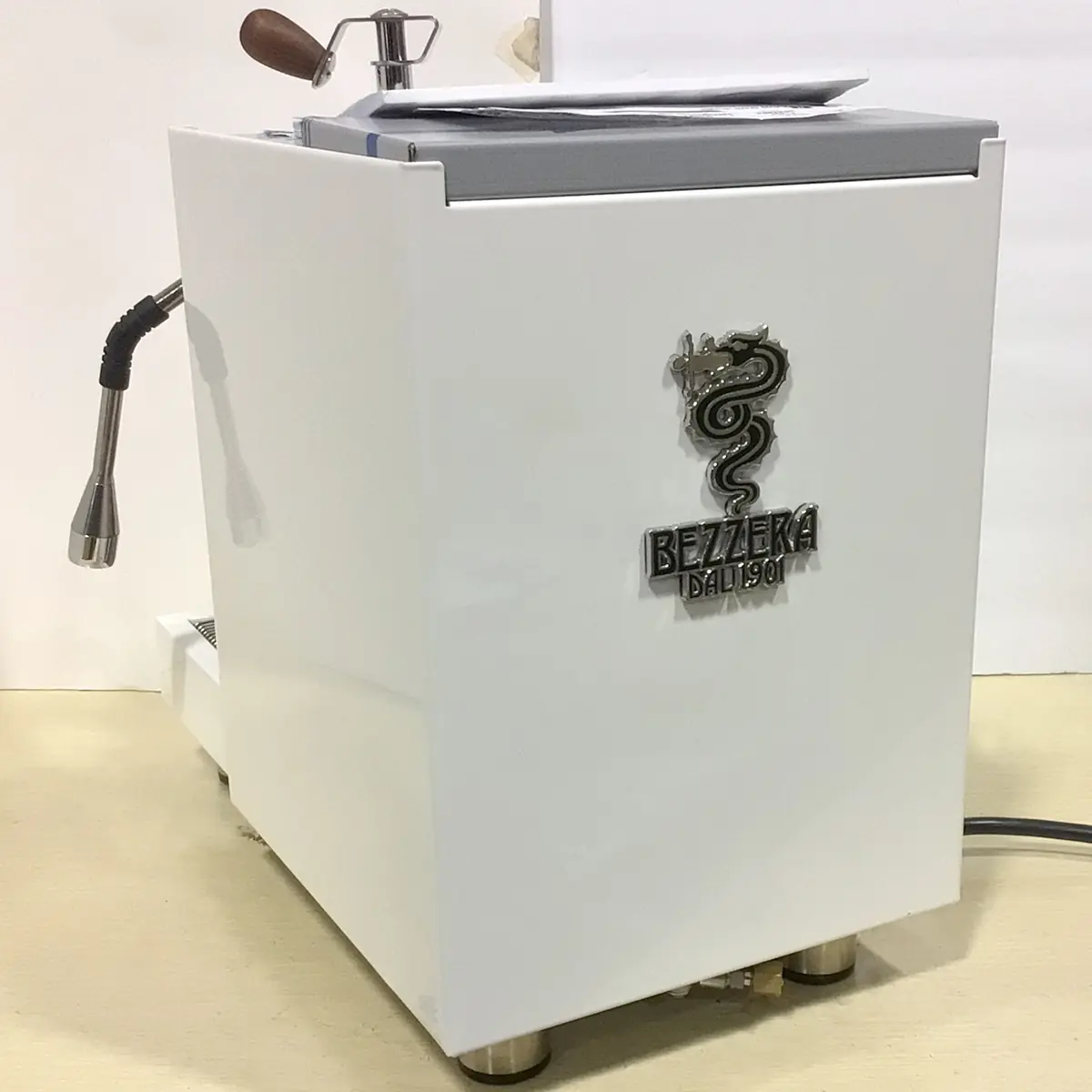 SOLD RETURNED & REFURBISHED - Bezzera Aria HX Special Edition Espresso Machine w/ Flow Control (C104) featuring a dragon logo and “Dal 1901” text, steam wand, on a light countertop with a plain backdrop.