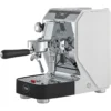 The VBM Domobar Single Boiler Espresso Machine has a stainless steel and white exterior, portafilter handle, pressure gauges, control buttons, and a metal drip tray with the VBM logo on the front.