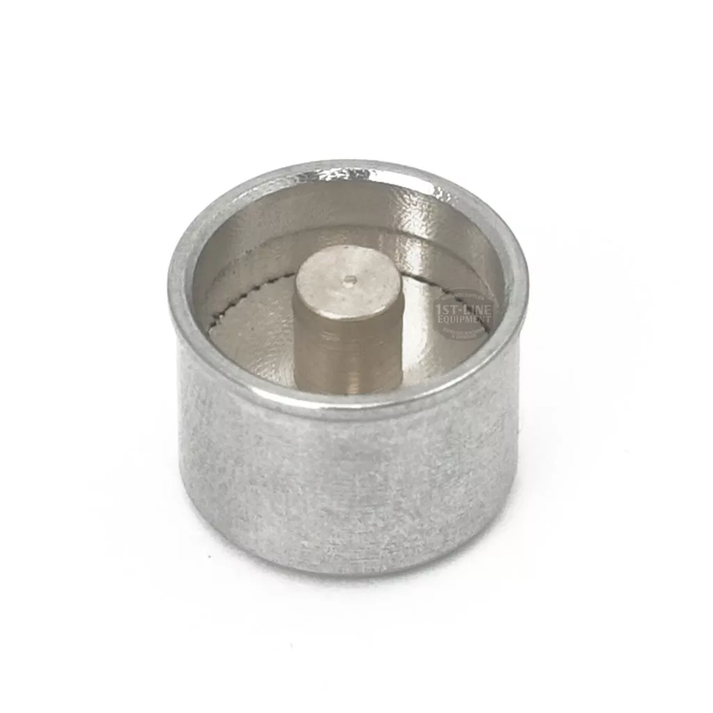 The Lelit MC786 Button for Switch Assembly is a cylindrical metal component featuring a hollow outer ring and a solid central post, resembling a mechanical switch assembly, shown on a white background. © 2025 1st-line.com