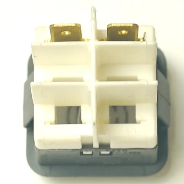 Close-up of the V.4417 WHITE INDICATOR LIGHT electrical component featuring four square openings, two visible brass terminals on top, and a white indicator light, set against a plain white background. © 2025 1st-line.com