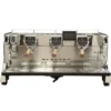 The Elektra Evok 3 Group Commercial Espresso Machine offers three group heads, wooden handles, digital displays, and a central touchscreen—all crafted in stainless steel for professional coffee preparation.
