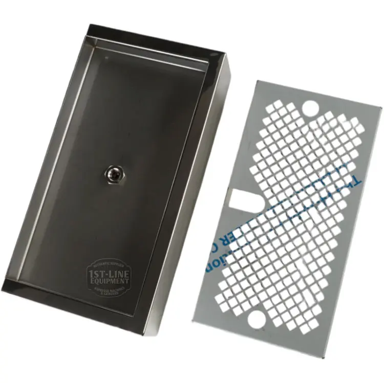 The Torre KITT02BACIL Stainless Steel Drip Tray Kit includes a rectangular drip tray and removable slotted metal grate for catching spills from espresso machines or similar equipment. © 2025 1st-line.com