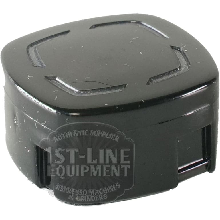 The Carimali (37.05209.L1) Square Key Selection Button is a black plastic cap with rounded edges, a side slot, and subtle raised top markings—designed for use with Carimali Selection Button assemblies.