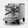 The Rocket R58 Tune X Dual Boiler Espresso Machine features a sleek stainless steel design with dual pressure gauges, a portafilter, steam wand, and digital display, shown against a plain white background.
