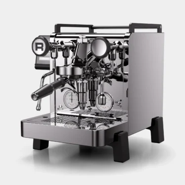 The Rocket R58 Tune X Dual Boiler Espresso Machine features a sleek stainless steel design with dual pressure gauges, a portafilter, steam wand, and digital display, shown against a plain white background.